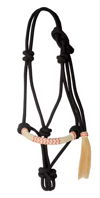 Black braided rope halter with a beige and red patterned leather cheek piece and a light tan hanging tassel