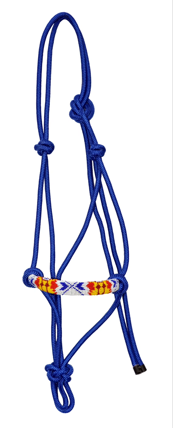 A blue braided rope halter with a decorative woven browband featuring red, yellow, and white geometric patterns